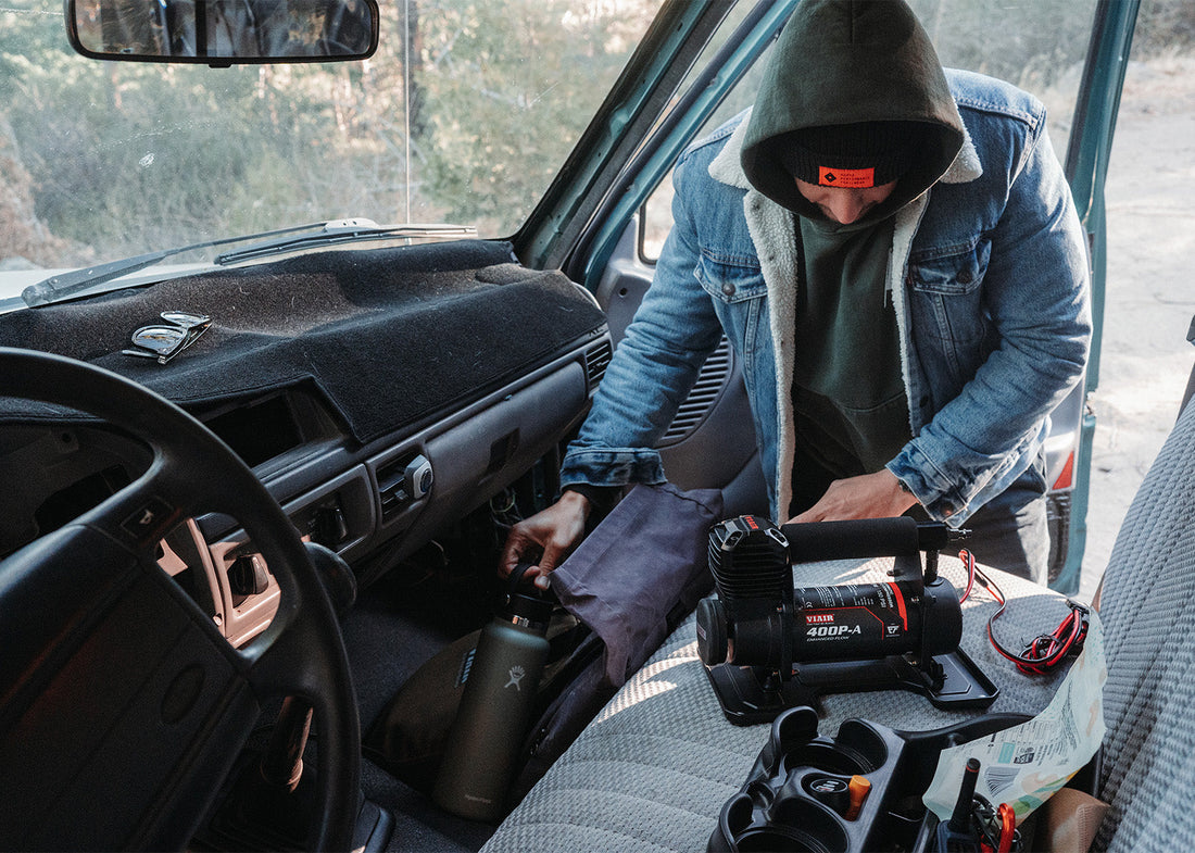 EF 400P-A on the passenger seat, driver grabbing stuff from the seat