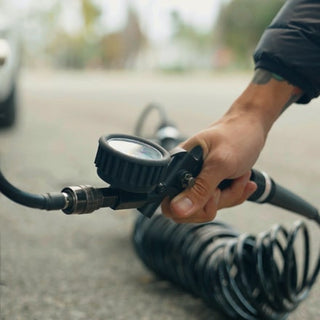 Man inflating with compressor