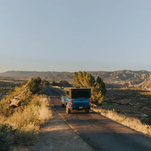 SUV driving into the desert